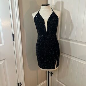 Black Sequin Ruched Sheath Dress with Plunge Neckline. Semi formal. Night Life.